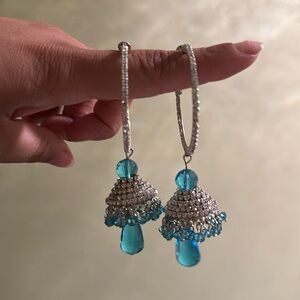 Women’s blue hoop earring